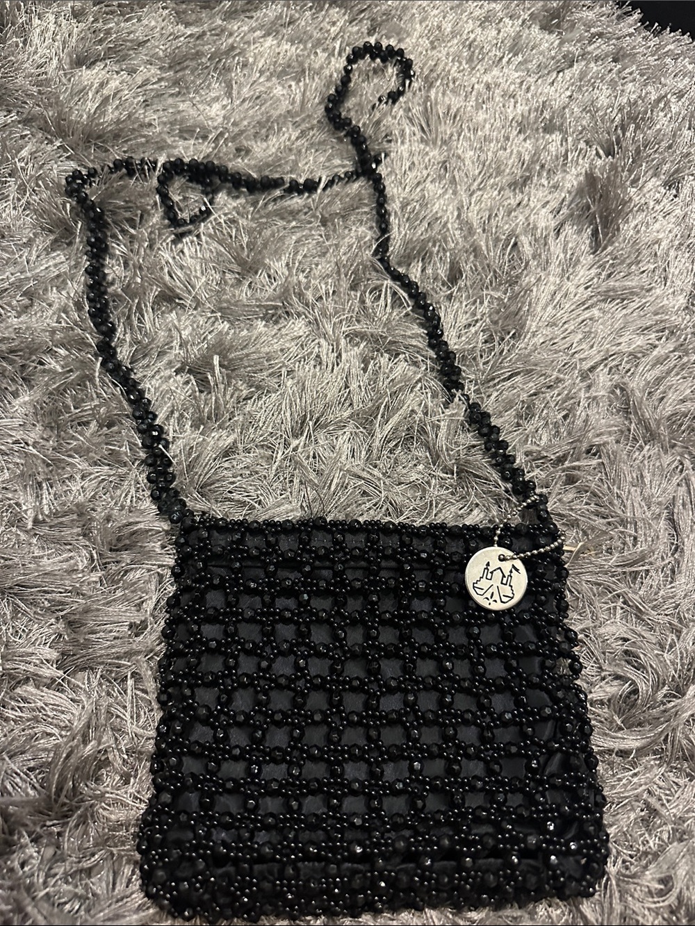 Beaded Crossbody Bag with Logo Charm - Black